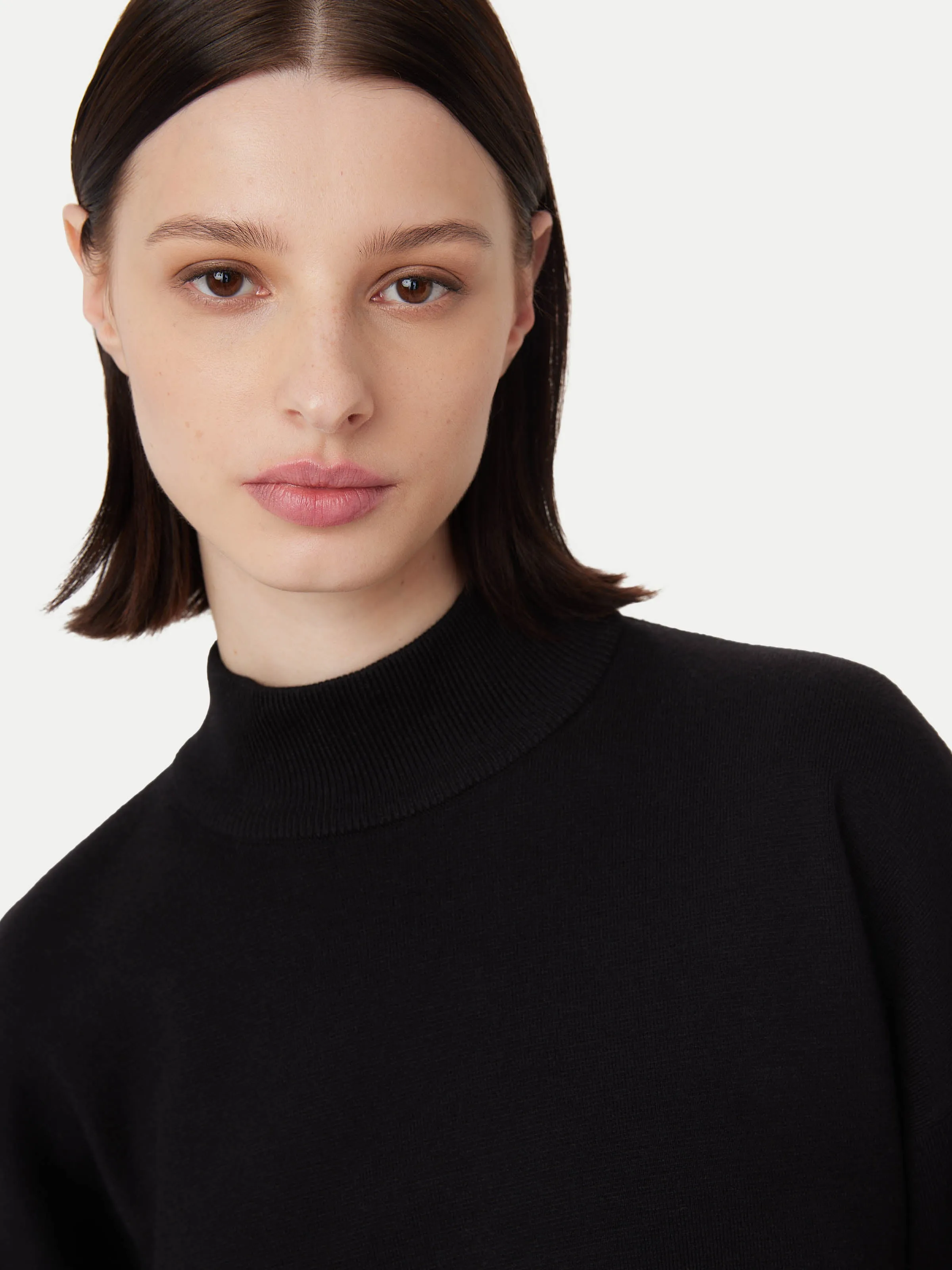 The Compact Mockneck Sweater in Black